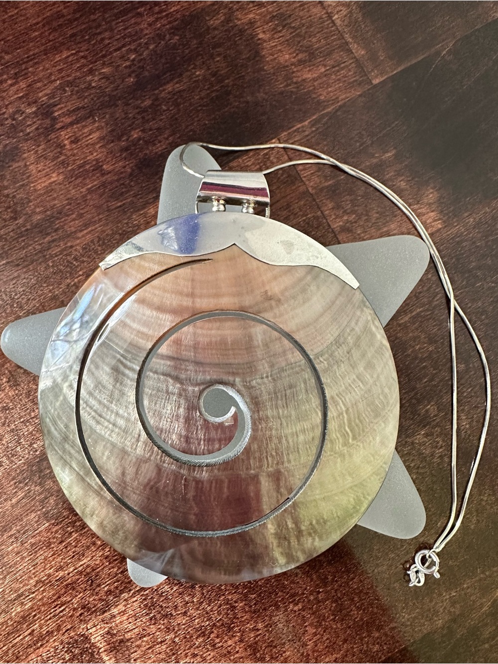 Sterling silver and carved shell pendant necklace